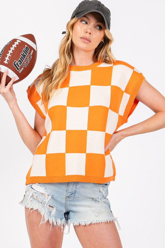 CHECKERED CHARM TOP IN ORANGE AND WHITE