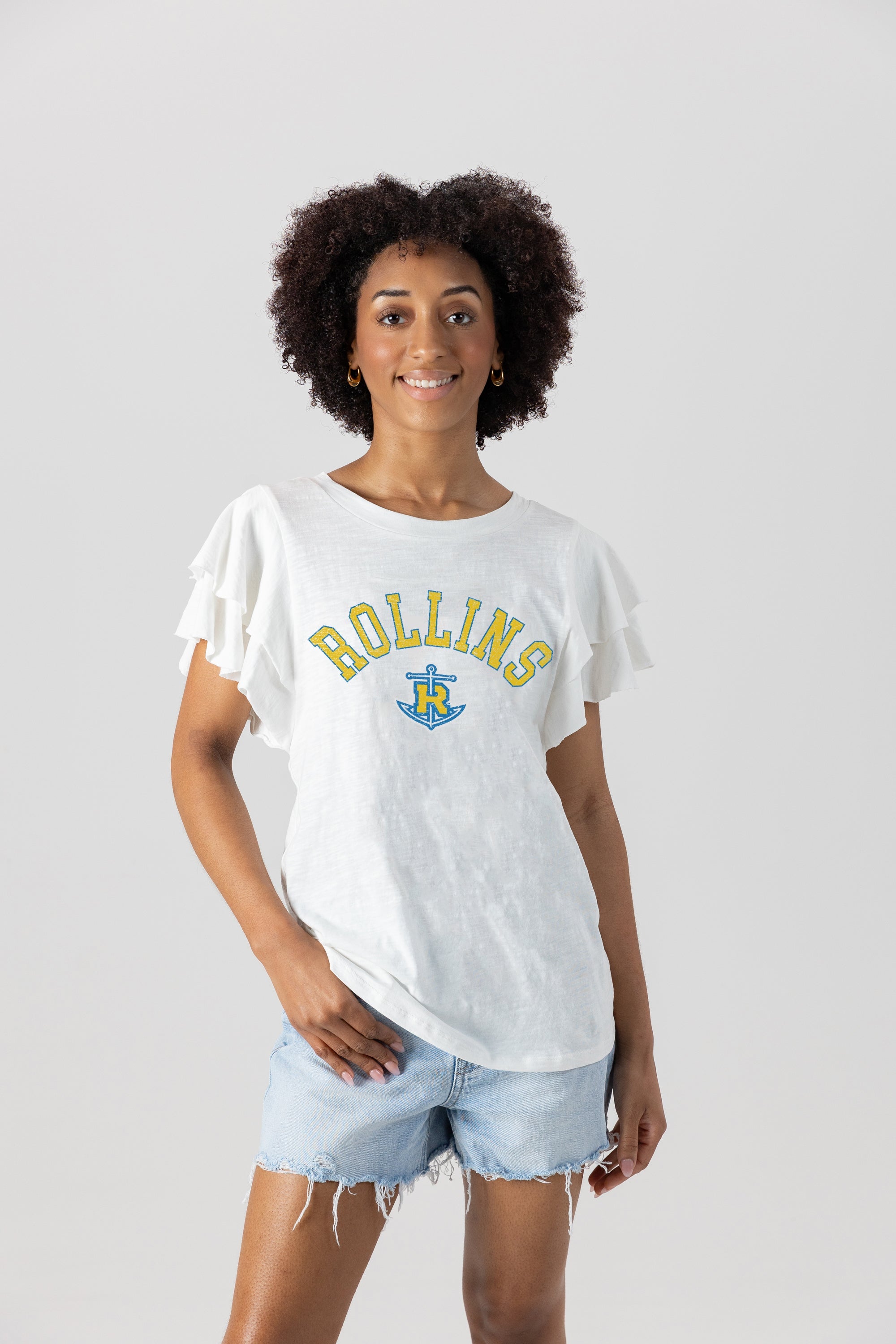 White Rollins Tars ALL IN TO WIN Flutter Sleeve Top - Front On Model with Denim Shorts | Gameday Couture - SOHO