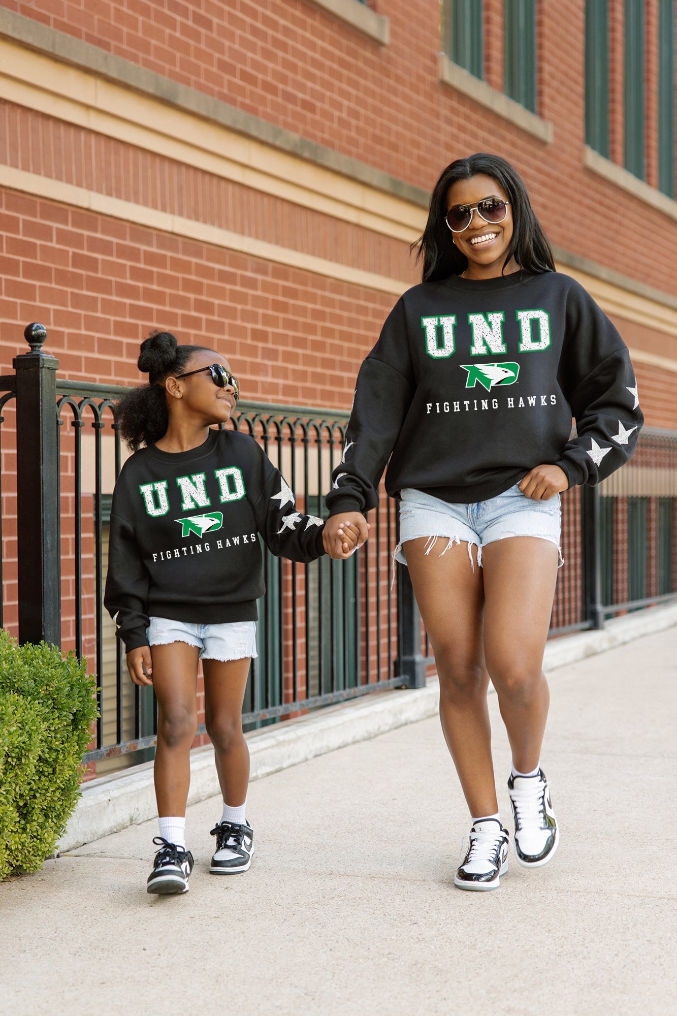 NORTH DAKOTA FIGHTING HAWKS VELOCITY KIDS STAR SLEEVE CREWNECK PULLOVER