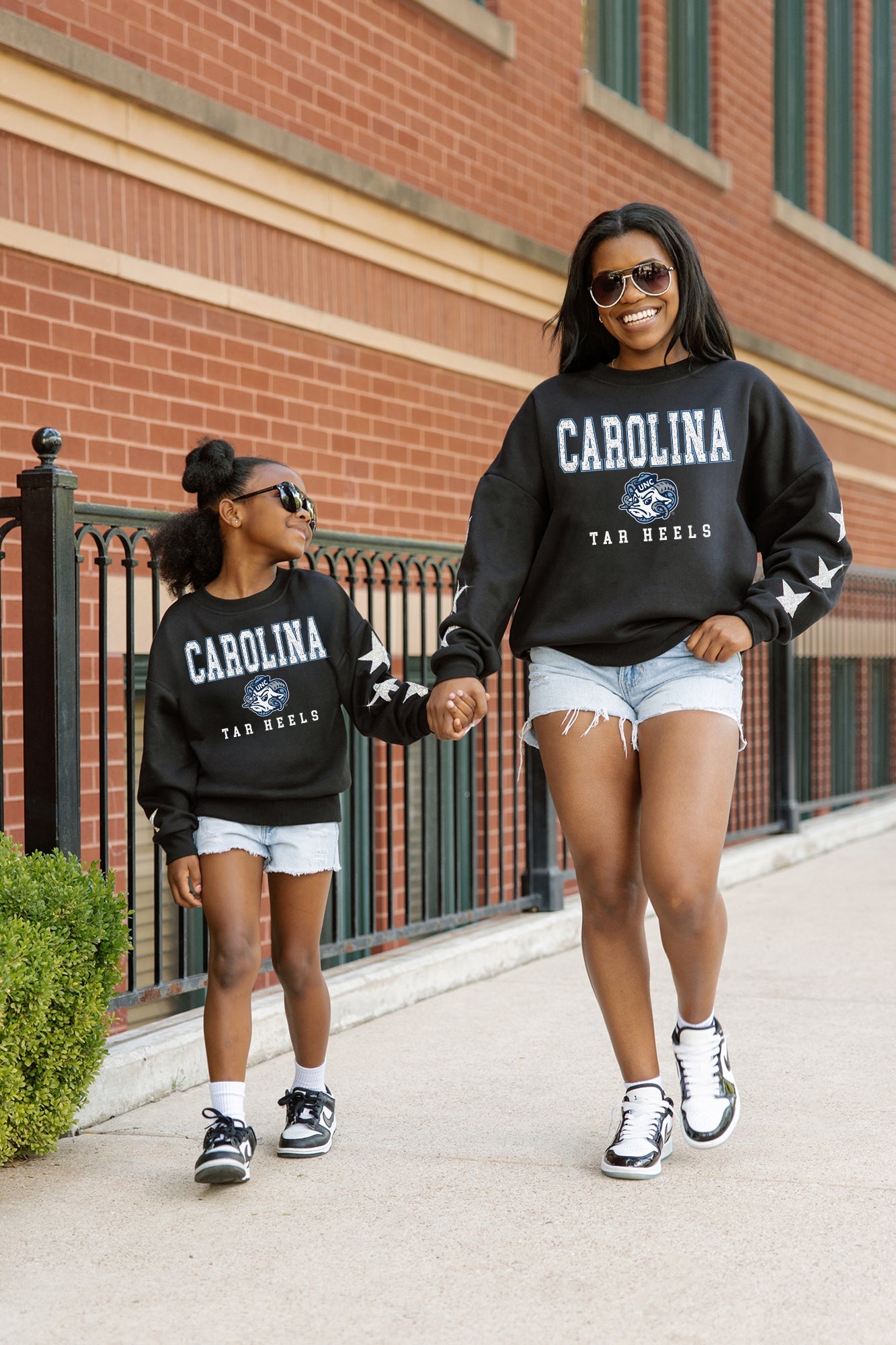 NORTH CAROLINA TAR HEELS VELOCITY KIDS STAR SLEEVE CREWNECK PULLOVER
