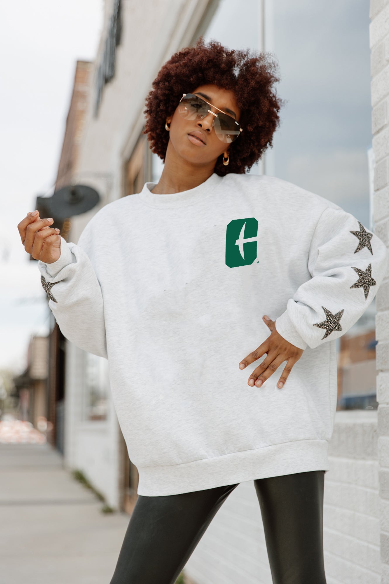 Ash Charlotte 49ers DEDICATION Star-Sleeve Crewneck Pullover - On Model Front Close-Up | Gameday Couture - SOHO