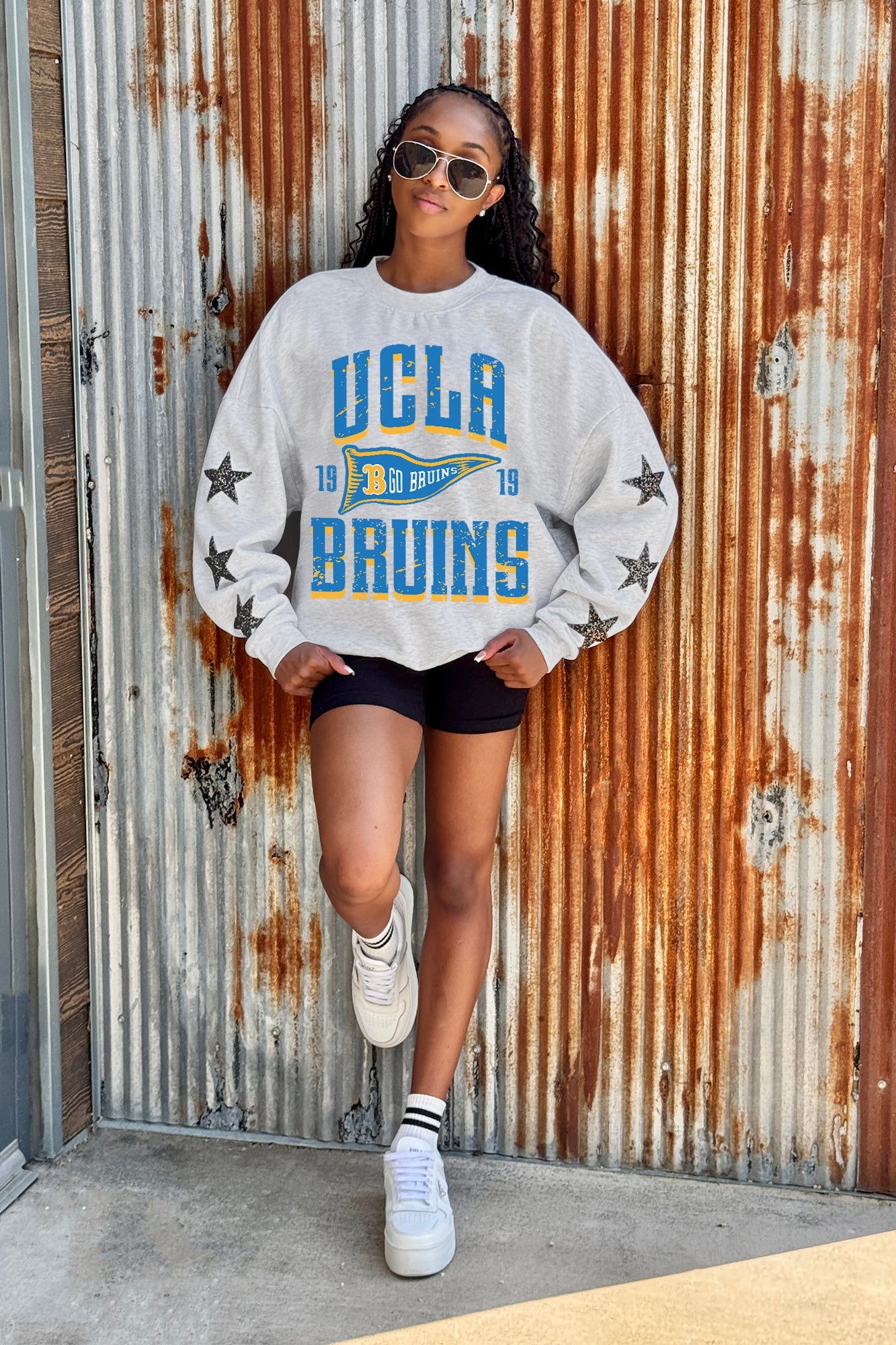 UCLA BRUINS PENNANT PRIDE EMBELLISHED STAR SLEEVE CREWNECK PULLOVER