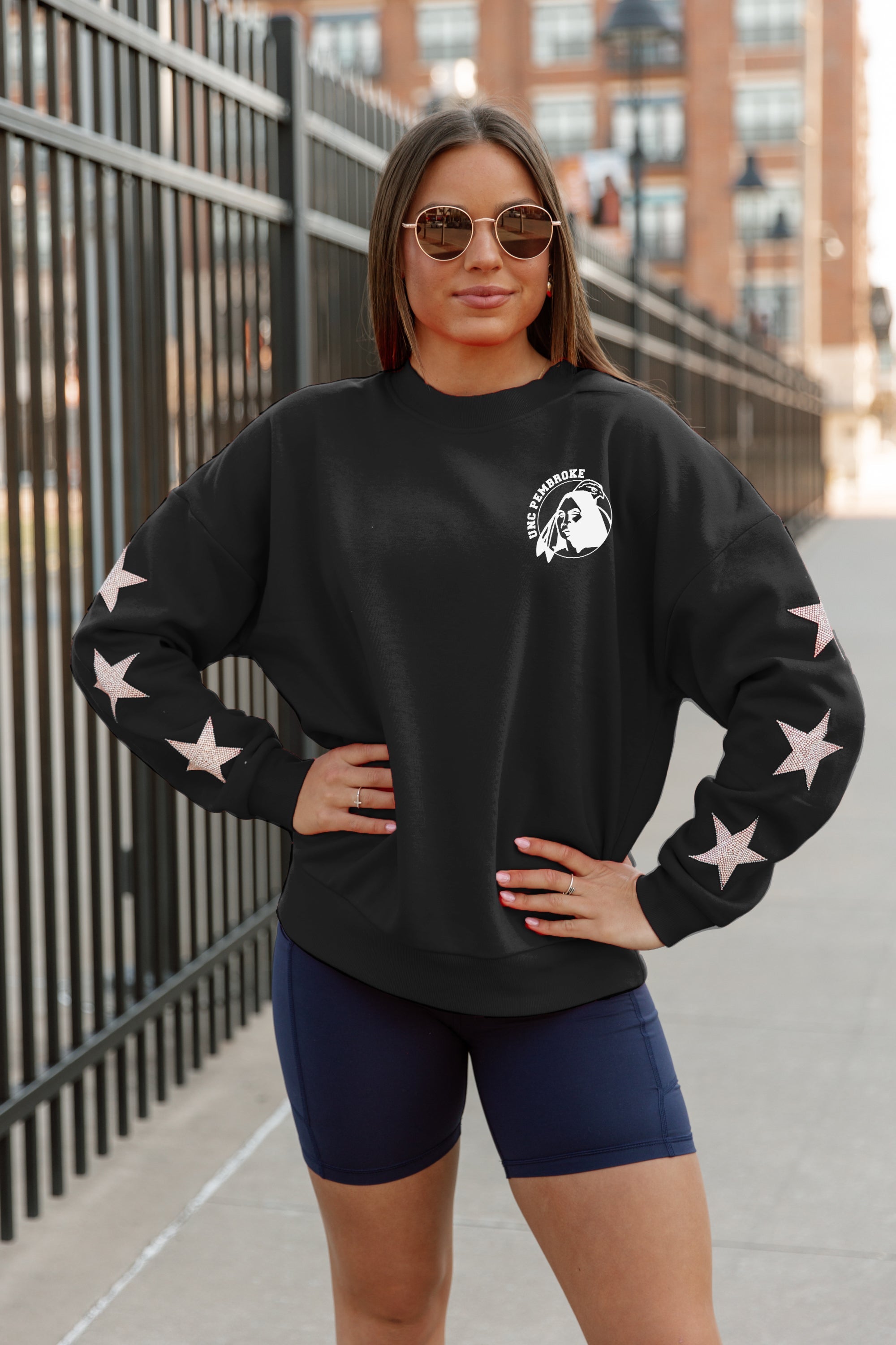 UNC AT PEMBROKE BRAVES DEDICATION EMBELLISHED STAR SLEEVE CREWNECK PULLOVER