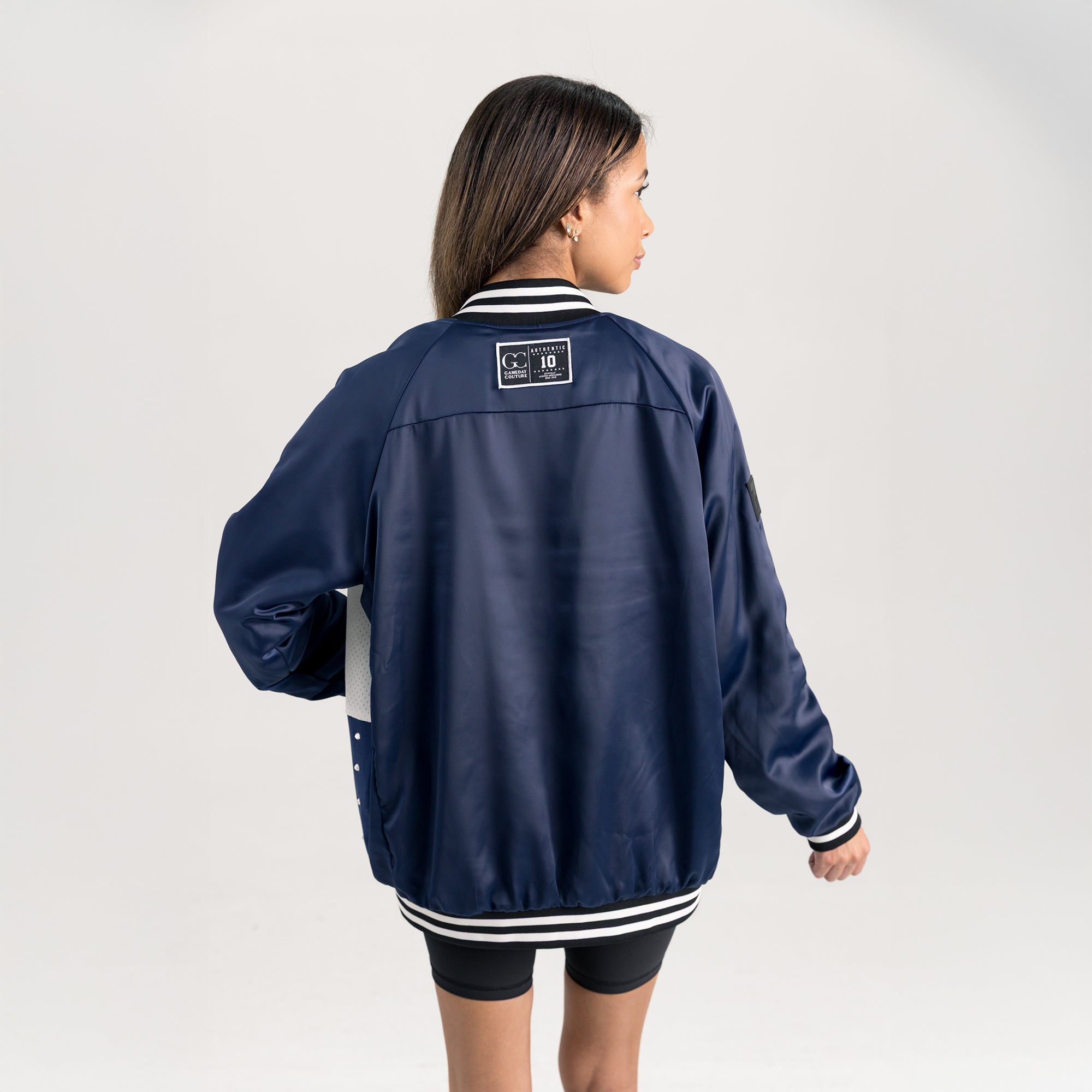 NORTHERN ARIZONA LUMBERJACKS REFINED RIVALRY THROWBACK VARSITY BOMBER JACKET
