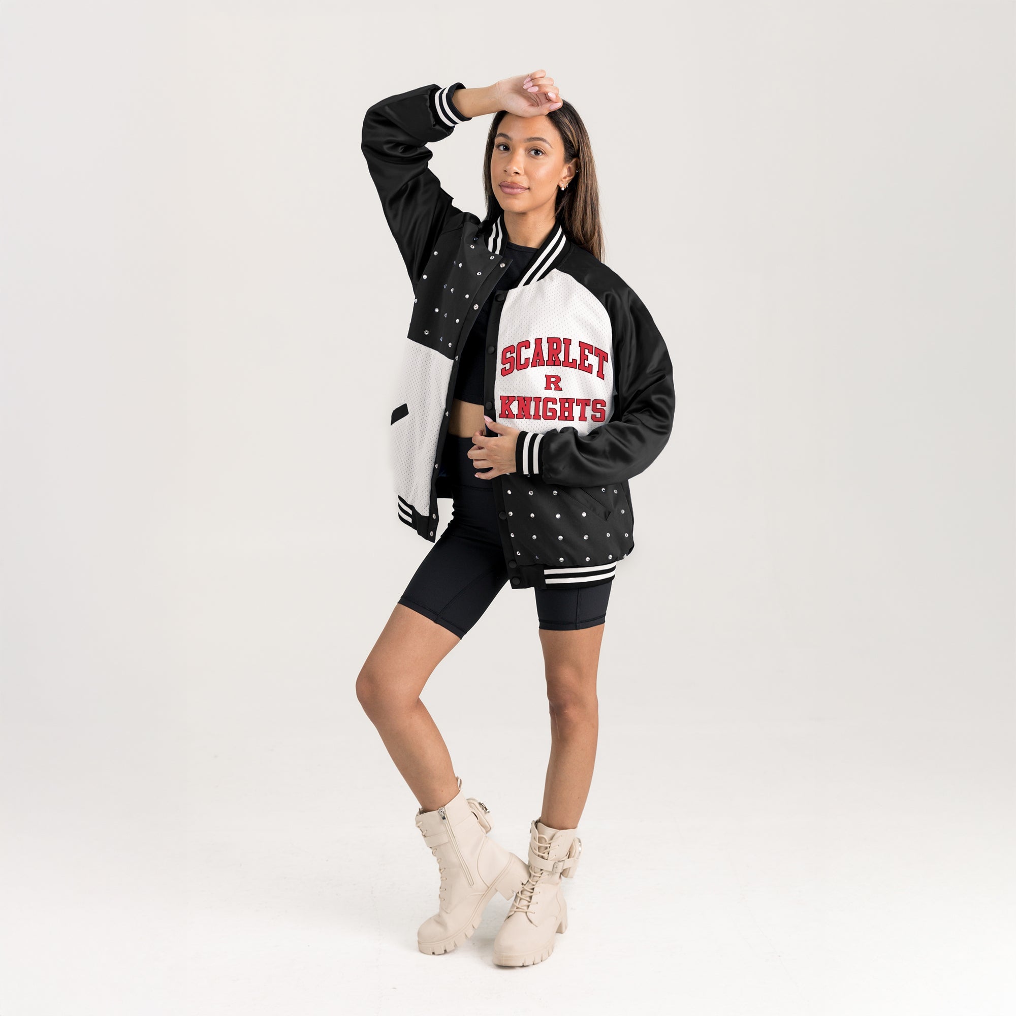 Black & White Rutgers Scarlet Knights Varsity Bomber Jacket - Angled Studio Shot with Boots | Gameday Couture - SOHO