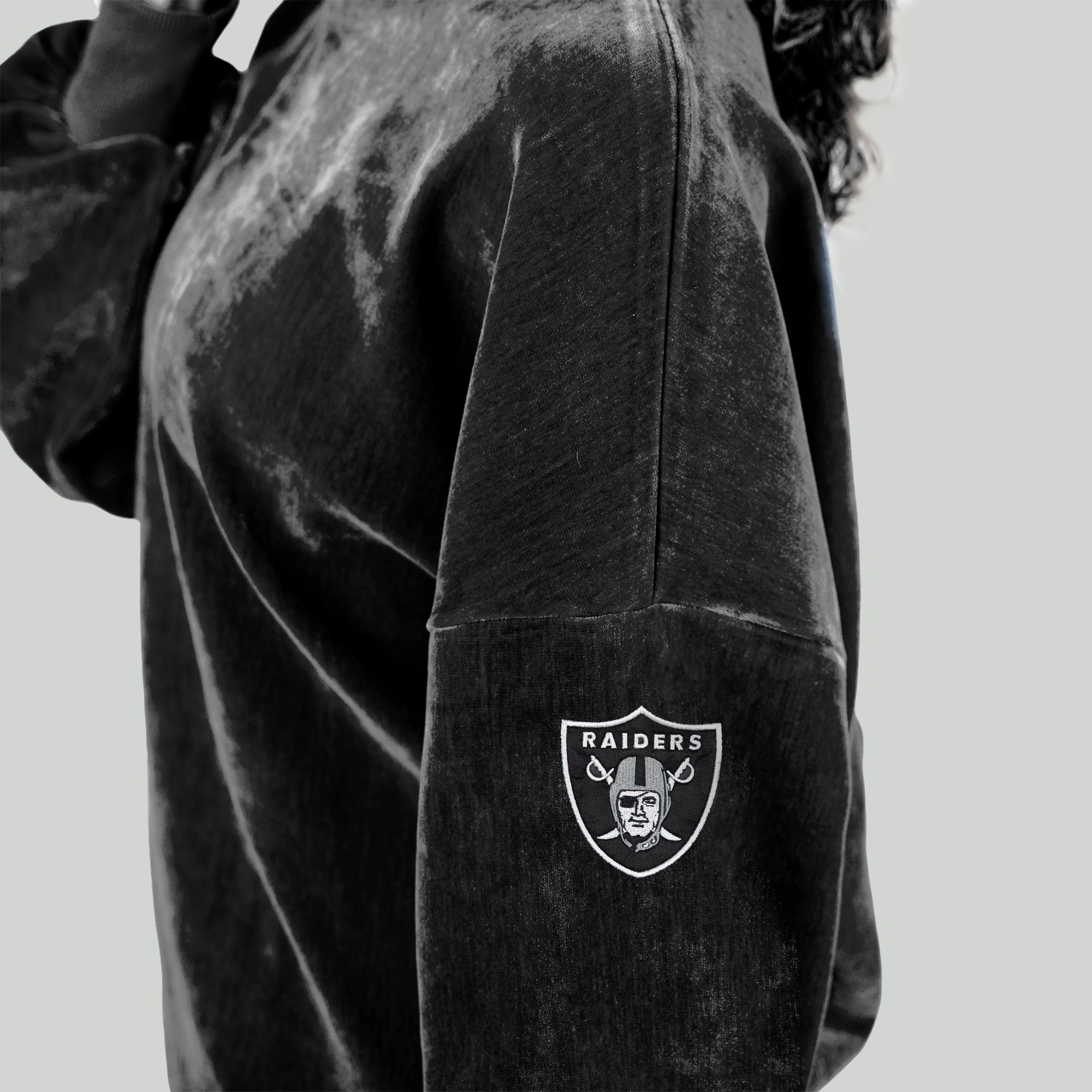 Black Raiders Chenille Pullover - Satin Arch Logo Graphic Close-Up Detail | Gameday Couture - SOHO