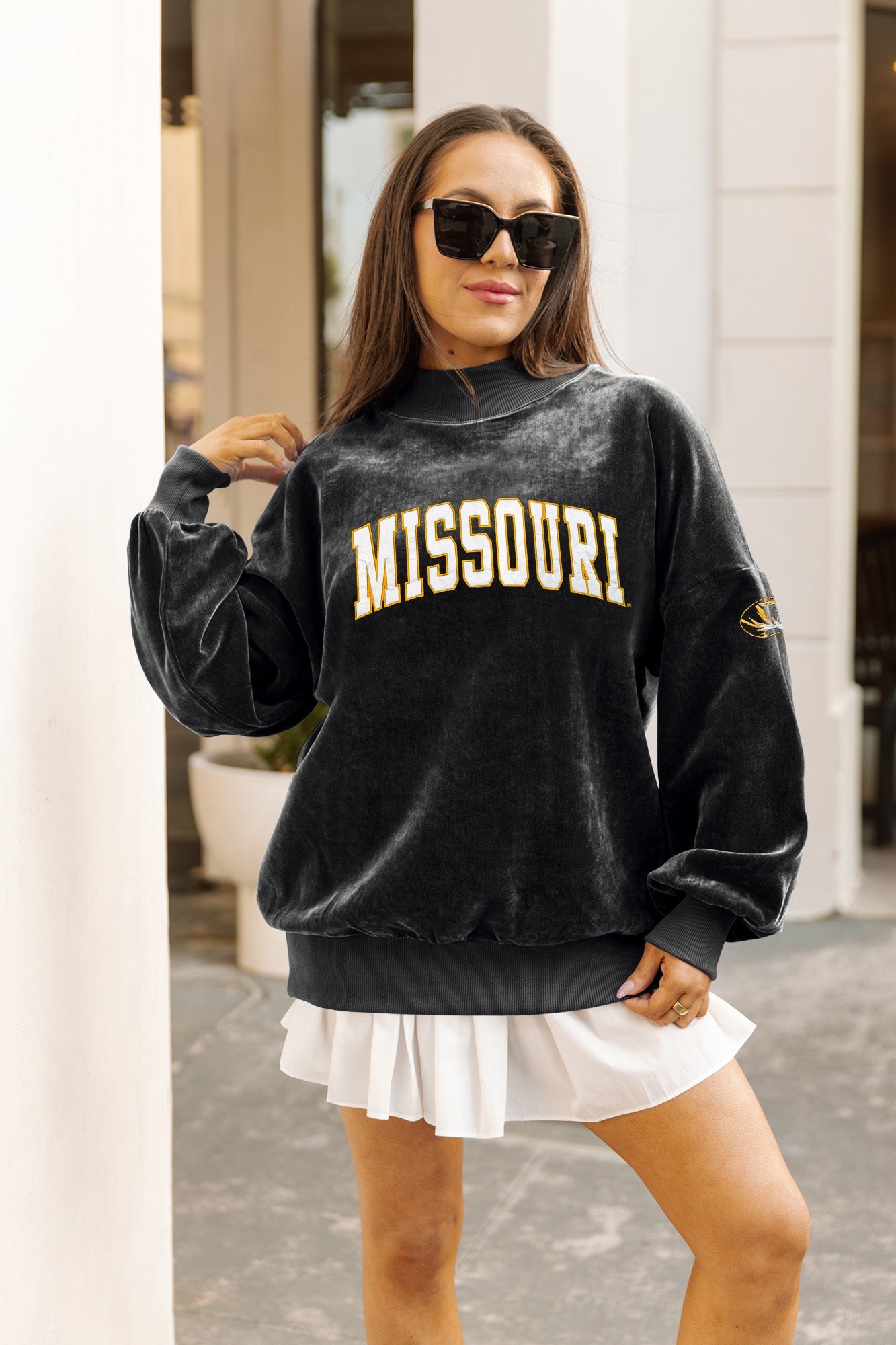 Black Missouri Tigers mock neck chenille pullover styled over white pleated skirt - Outdoor Lifestyle Look | Gameday Couture - SOHO