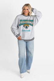 JACKSONVILLE JAGUARS GRIDIRON DRIVE CREW FLEECE RINGER SWEATSHIRT