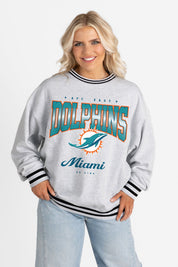 MIAMI DOLPHINS GRIDIRON DRIVE CREW FLEECE RINGER SWEATSHIRT