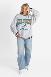 MIAMI DOLPHINS GRIDIRON DRIVE CREW FLEECE RINGER SWEATSHIRT