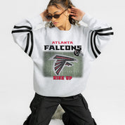 ATLANTA FALCONS OFF THE GRID STRIPE SLEEVE CREWNECK SWEATSHIRT