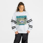 JACKSONVILLE JAGUARS OFF THE GRID STRIPE SLEEVE CREWNECK SWEATSHIRT