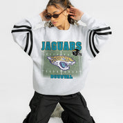 JACKSONVILLE JAGUARS OFF THE GRID STRIPE SLEEVE CREWNECK SWEATSHIRT