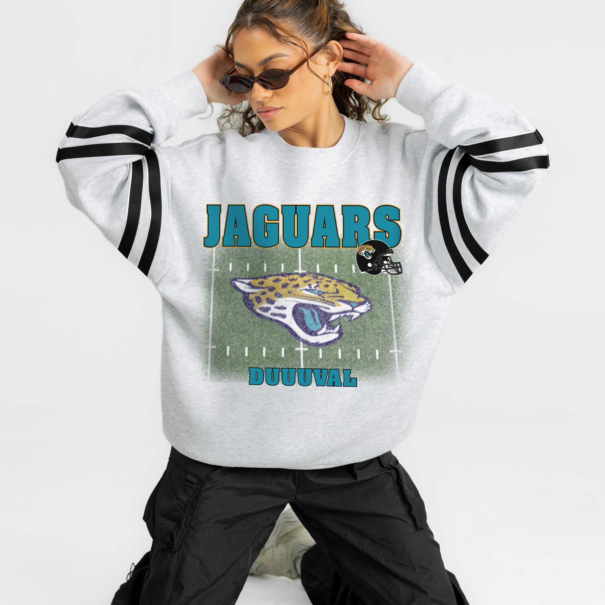 JACKSONVILLE JAGUARS OFF THE GRID STRIPE SLEEVE CREWNECK SWEATSHIRT