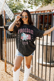 Black BORN FREE VINTAGE WASH BOYFRIEND TEE - Front View Festival Outfit | Gameday Couture - SOHO