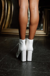 TO A POINT PLATFORM HEELED BOOTIE IN WHITE