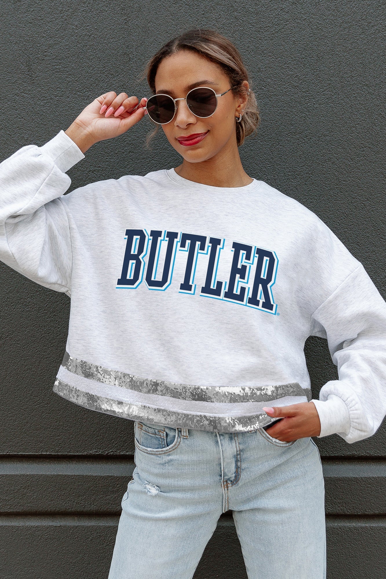 Ash/Silver Butler Bulldogs Pass The Shine Sequin Trim Mid-Crop Sweatshirt - Front On Model | Gameday Couture - SOHO