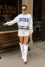 DUKE BLUE DEVILS PASS THE SHINE LONG SLEEVE METALLIC SHIMMER-STRIPE TOP WITH RIBBED NECKLINE AND CUFFS