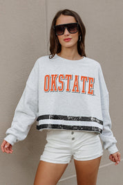 OKLAHOMA STATE COWBOYS PASS THE SHINE LONG SLEEVE METALLIC SHIMMER-STRIPE TOP WITH RIBBED NECKLINE AND CUFFS