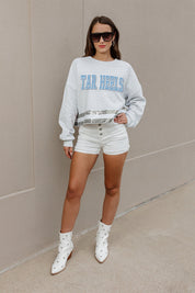 NORTH CAROLINA TAR HEELS PASS THE SHINE LONG SLEEVE METALLIC SHIMMER-STRIPE TOP WITH RIBBED NECKLINE AND CUFFS