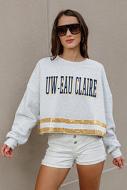 WISCONSIN-EAU CLAIRE BLUGOLDS PASS THE SHINE LONG SLEEVE METALLIC SHIMMER-STRIPE TOP WITH RIBBED NECKLINE AND CUFFS