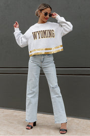 WYOMING COWBOYS PASS THE SHINE LONG SLEEVE METALLIC SHIMMER-STRIPE TOP WITH RIBBED NECKLINE AND CUFFS