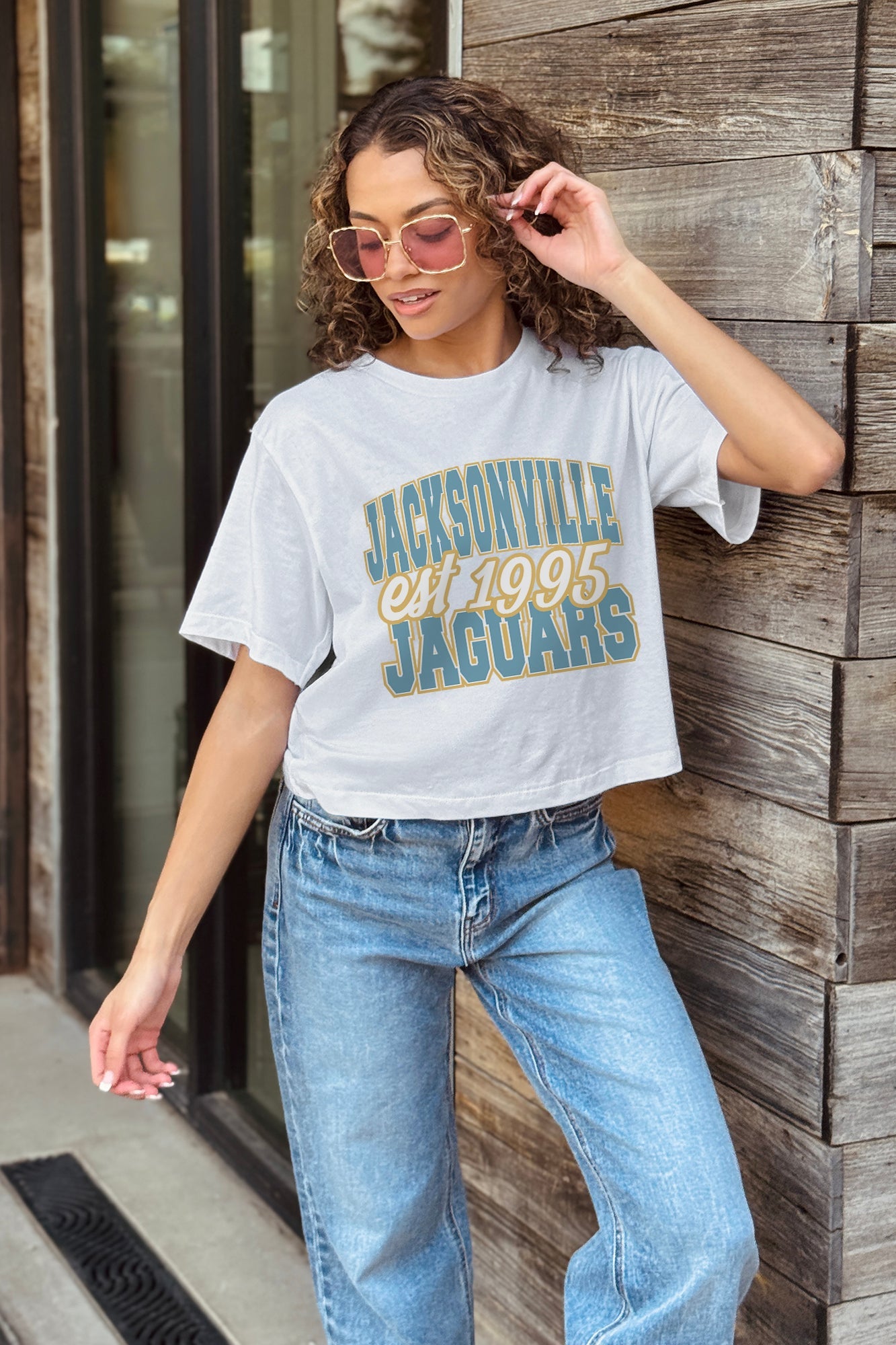 JACKSONVILLE JAGUARS DEEP ROOTS BOXY FIT CROPPED TEE