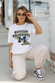 White Michigan Wolverines GAMEDAY GOALS Boxy-Fit Crop Tee - On Model Kneeling Street Style | Gameday Couture - SOHO