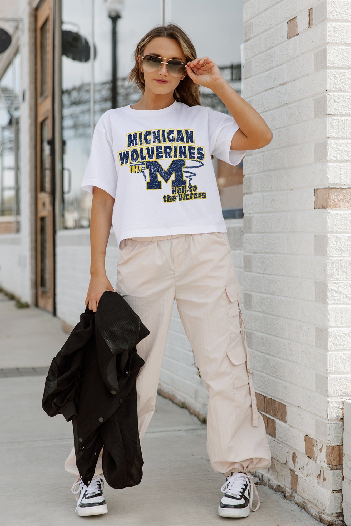 White Michigan Wolverines GAMEDAY GOALS Boxy-Fit Crop Tee - Full Length Styled Look with Cargo Pants | Gameday Couture - SOHO