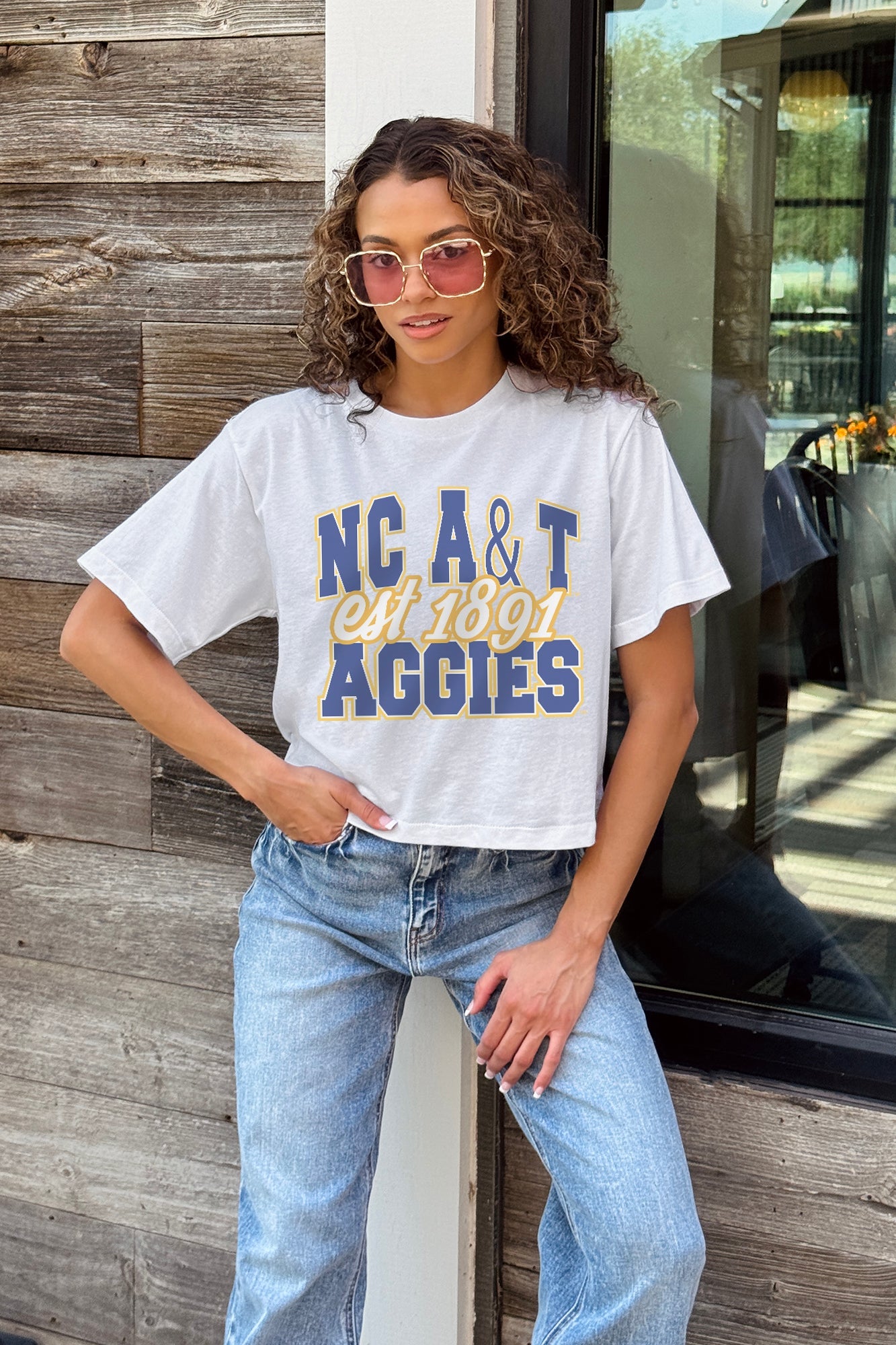 NORTH CAROLINA A&T STATE AGGIES DEEP ROOTS BOXY FIT WOMEN'S CROPPED TEE