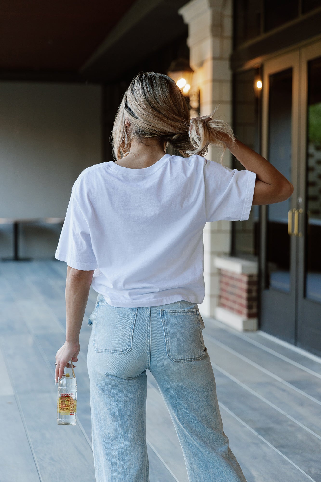 White Tennessee Titans Keep Playing Boxy-Fit Crop Tee - Back View On Model | Gameday Couture - SOHO