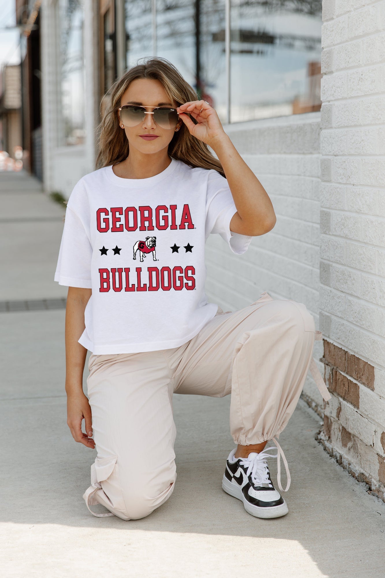 White GEORGIA BULLDOGS TO THE POINT BOXY CROP TEE - Crouching Pose Styled Look, Georgia Bulldogs Crop Top | Gameday Couture - SOHO