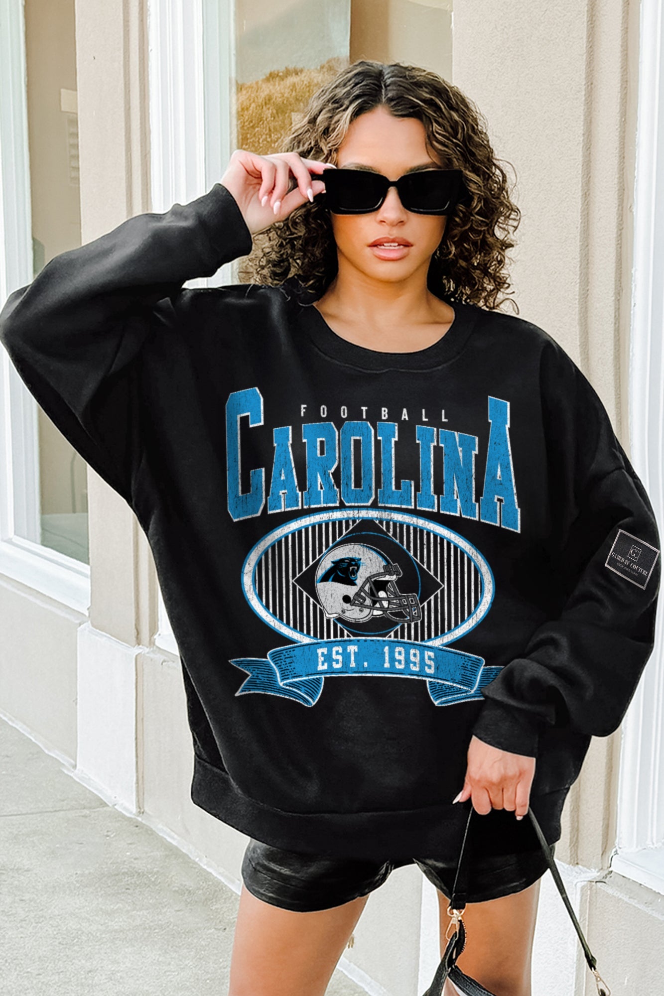 CAROLINA PANTHERS BOLD CHEERS BLACK LABEL PREMIUM FLEECE CREW SWEATSHIRT