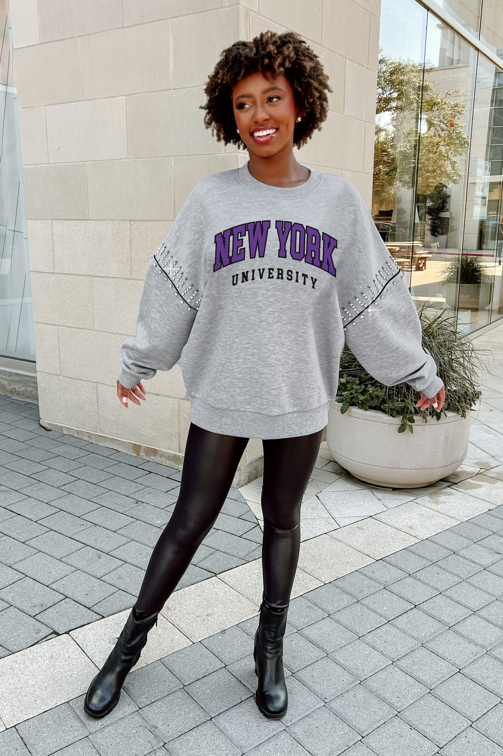 NEW YORK UNIVERSITY VIOLETS COMPETITIVE EDGE FLEECE PULLOVER WITH JEWEL SLEEVE EMBELLISHMENTS