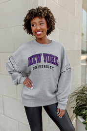 NEW YORK UNIVERSITY VIOLETS COMPETITIVE EDGE FLEECE PULLOVER WITH JEWEL SLEEVE EMBELLISHMENTS