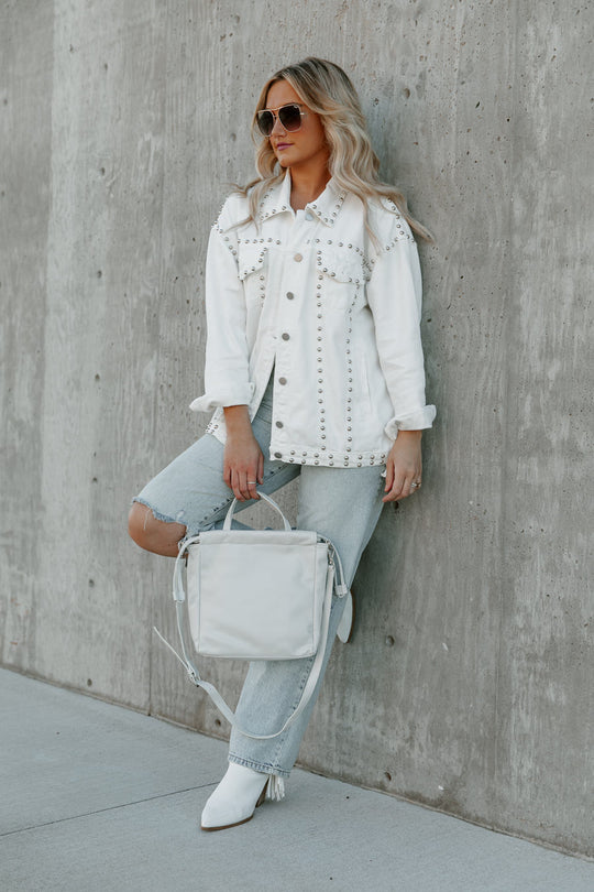 MENLO STUDDED AND DISTRESSED DENIM JACKET IN WHITE
