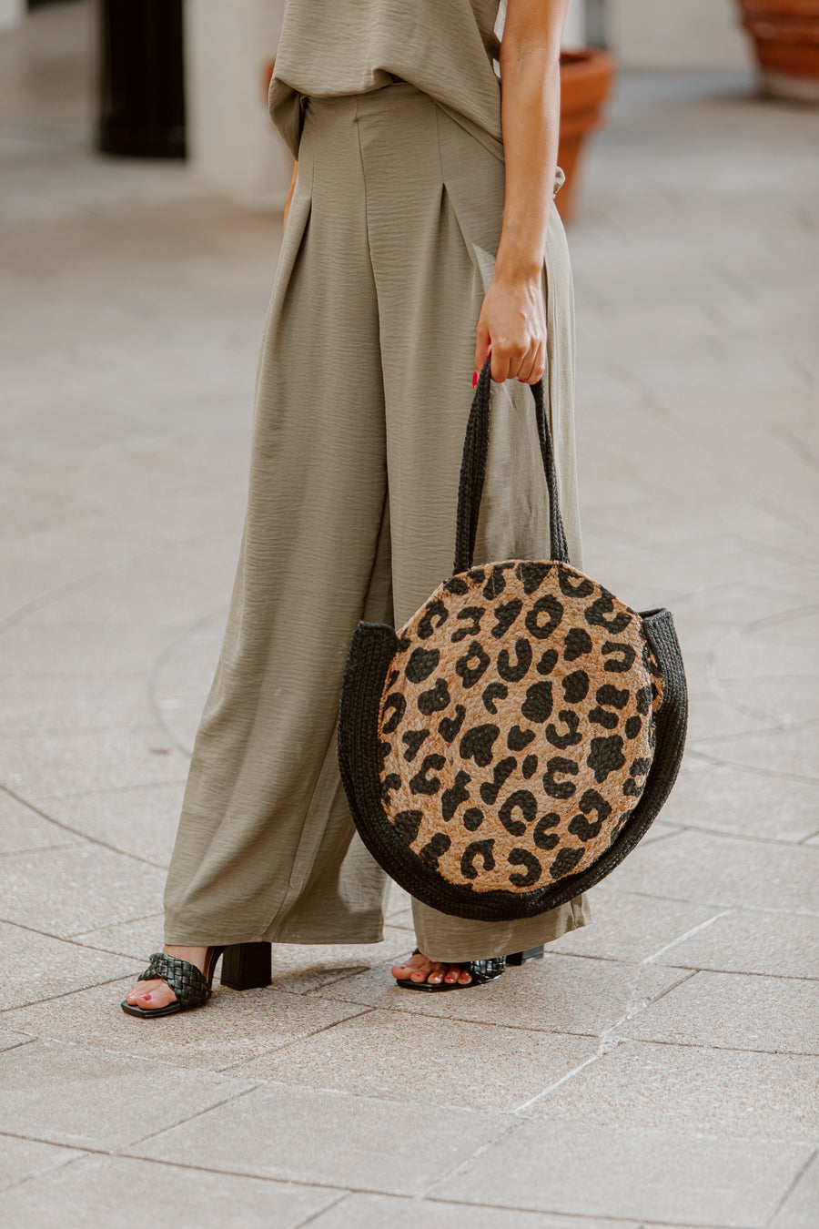 Leopard Woven Straw Tote Bag - Close-Up On Model, Round Circle Style | Gameday Couture - SOHO