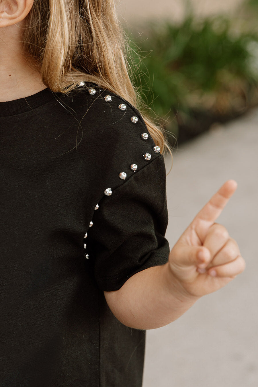 Black Wisconsin Badgers Kids Studded Crop Tee - Silver Stud Sleeve Detail Close-Up | Gameday Couture - SOHO