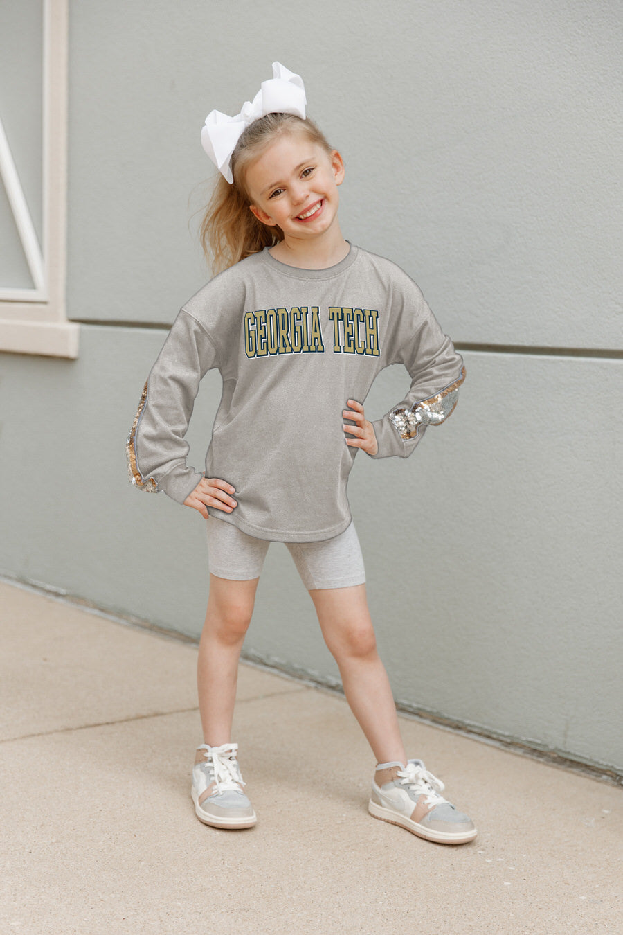 Grey Georgia Tech Yellow Jackets Guess Who's Back Kids Sequin Pullover - Front View On Model | Gameday Couture - SOHO