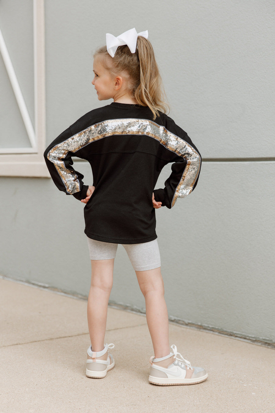 Black Iowa Hawkeyes GUESS WHO'S BACK Kids Sequin Pullover - Back View Showing Sequin Yoke Detail | Gameday Couture - SOHO