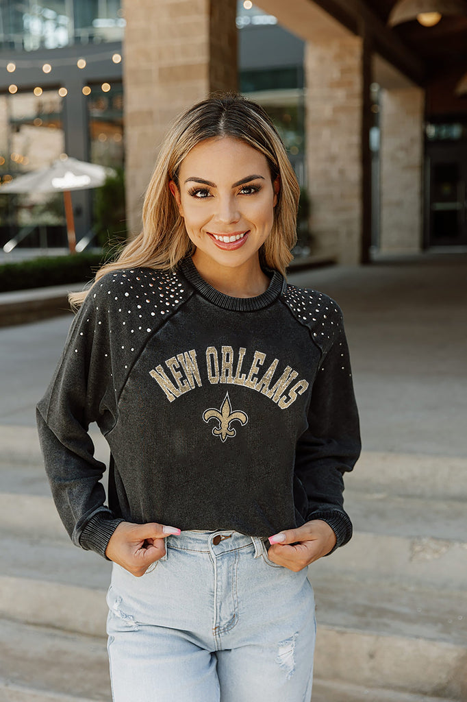 NEW ORLEANS SAINTS TOUCHDOWN FRENCH TERRY VINTAGE WASH STUDDED SHOULDER DETAIL LONG SLEEVE PULLOVER