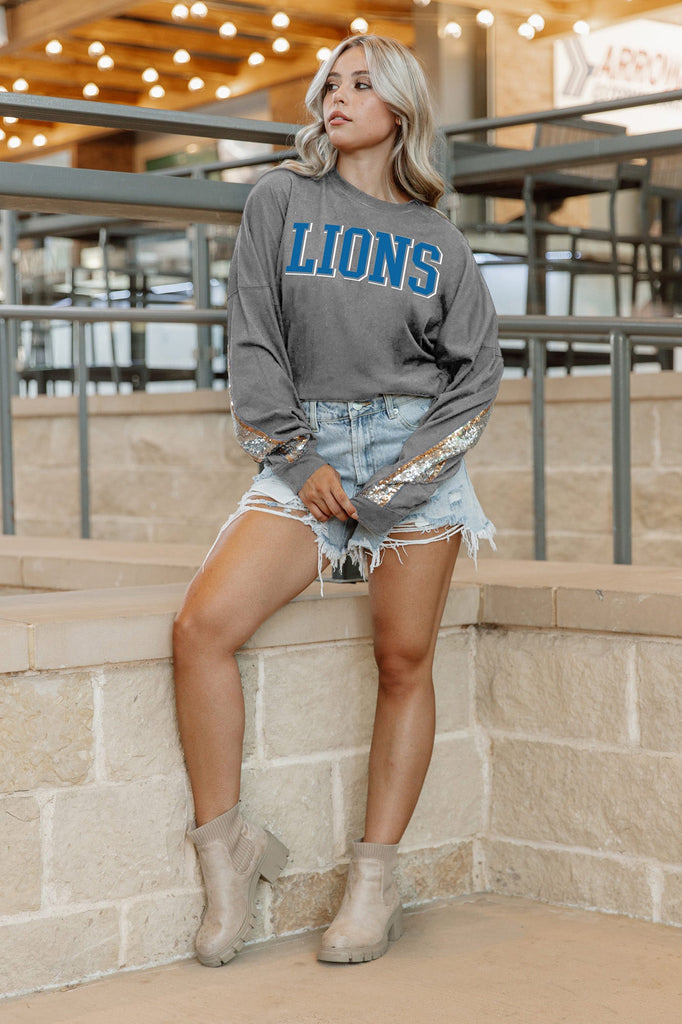 DETROIT LIONS GAMEDAY GLITZ LONG SLEEVE TEE WITH SEQUIN TRIM BACK AND SLEEVE DETAIL