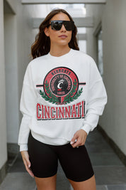 White Cincinnati Bearcats HOT SHOT Premium Fleece Drop Shoulder Crewneck Pullover - Front View On Model | Gameday Couture - SOHO