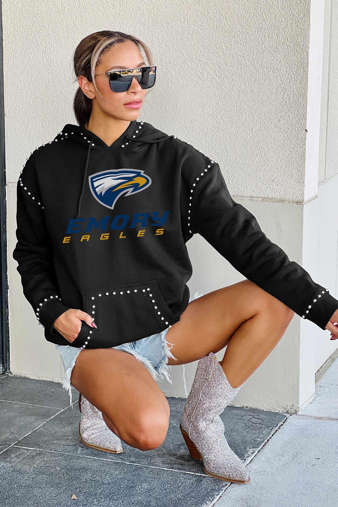 EMORY EAGLES BELLE OF THE BALL STUDDED DETAIL FLEECE HOODIE - On Model Side Pose | Gameday Couture - SOHO