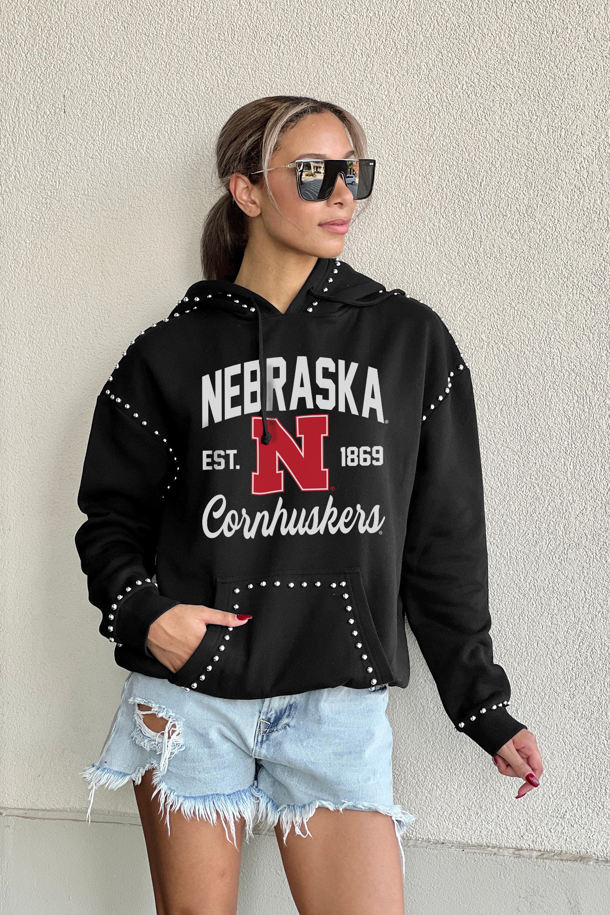 NEBRASKA CORNHUSKERS HERE FOR IT STUDDED DETAIL FLEECE FRONT POCKET HOODIE