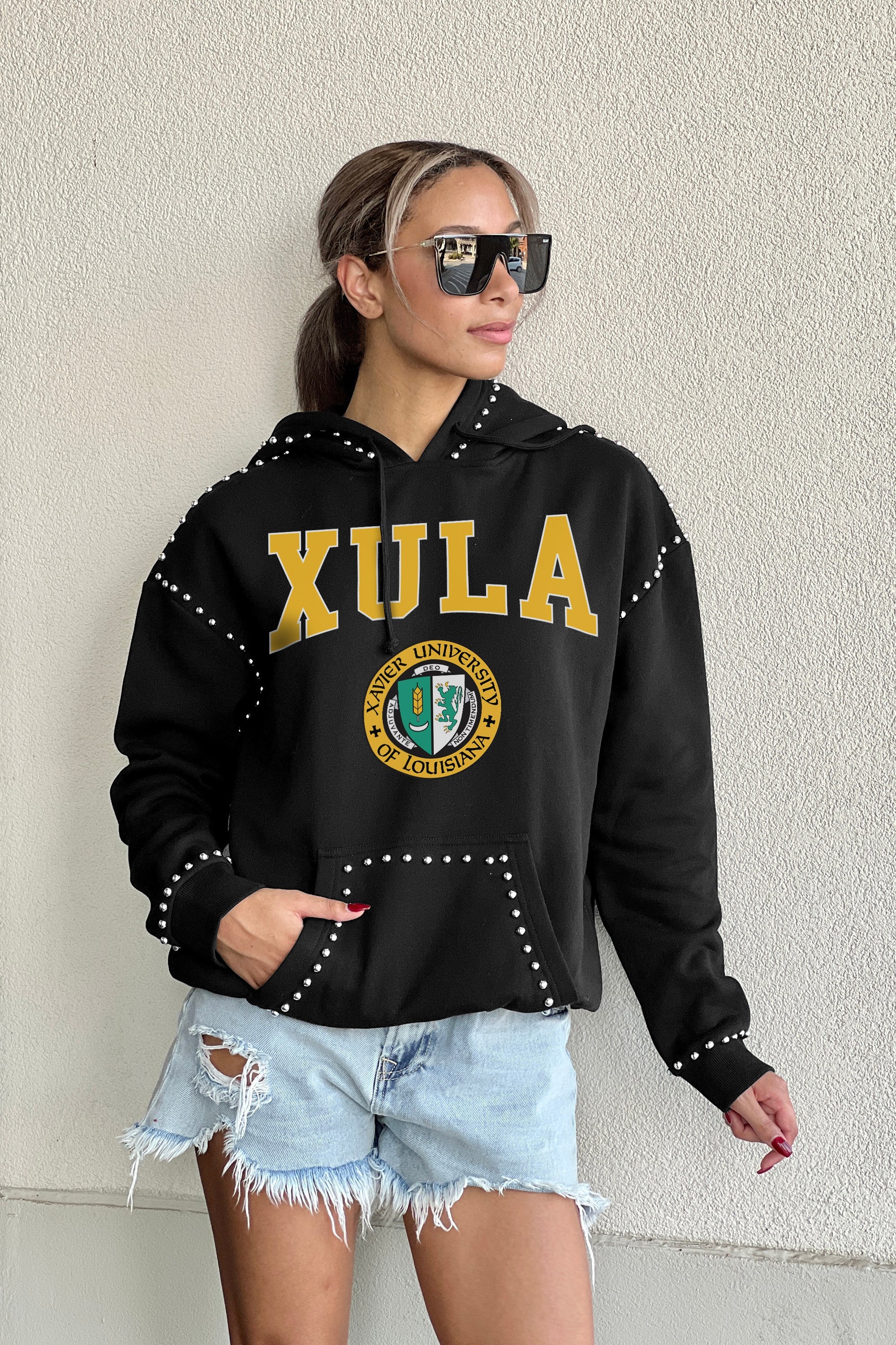 XAVIER UNIVERSITY OF LOUISIANA GOLD BELLE OF THE BALL STUDDED DETAIL FLEECE FRONT POCKET HOODIE - Side Profile | Gameday Couture - SOHO