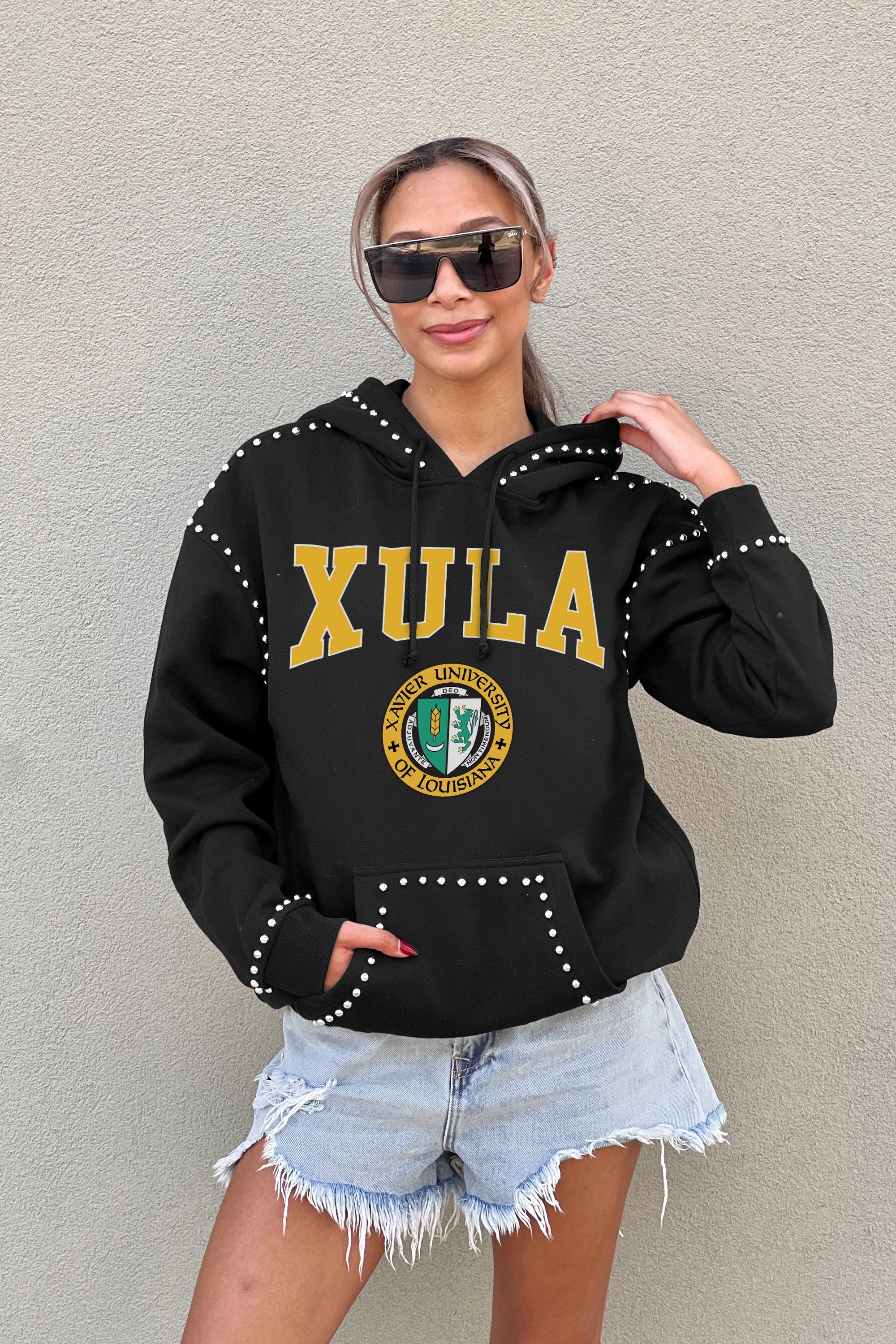 XAVIER UNIVERSITY OF LOUISIANA GOLD BELLE OF THE BALL STUDDED DETAIL FLEECE FRONT POCKET HOODIE - Styled Look | Gameday Couture - SOHO